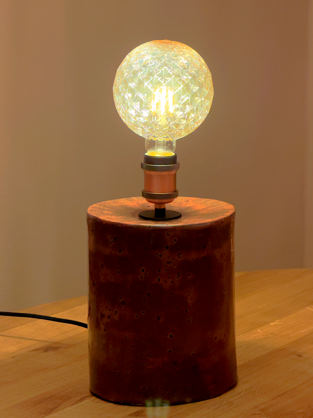 Peppered plum ceramic base with vintage pinecone LED light